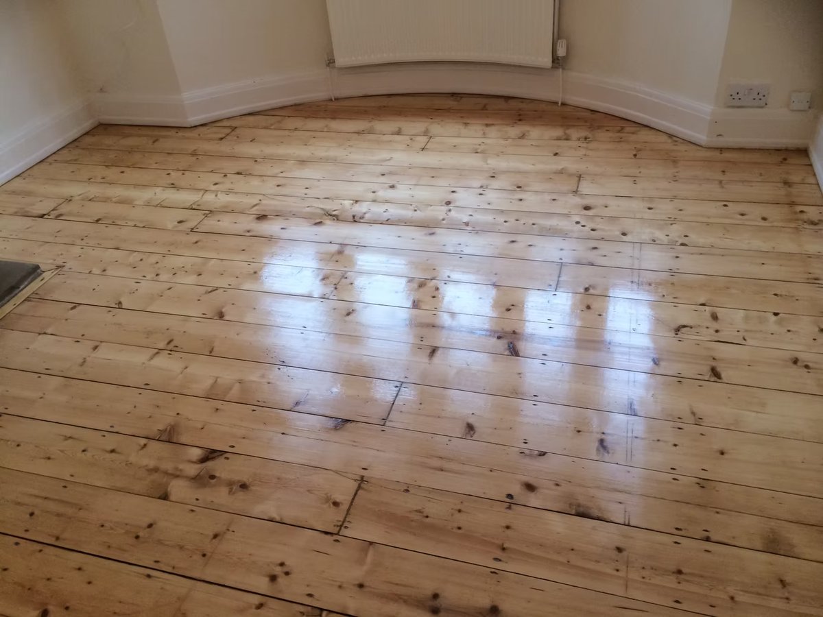 Refinished wood flooring in a room