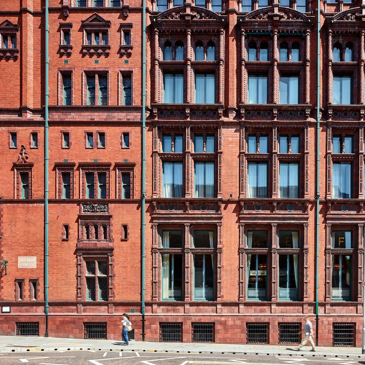 Detailed brick facade of a period building, suitable for restoration portfolio.