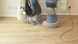 Floor sanding machine in action