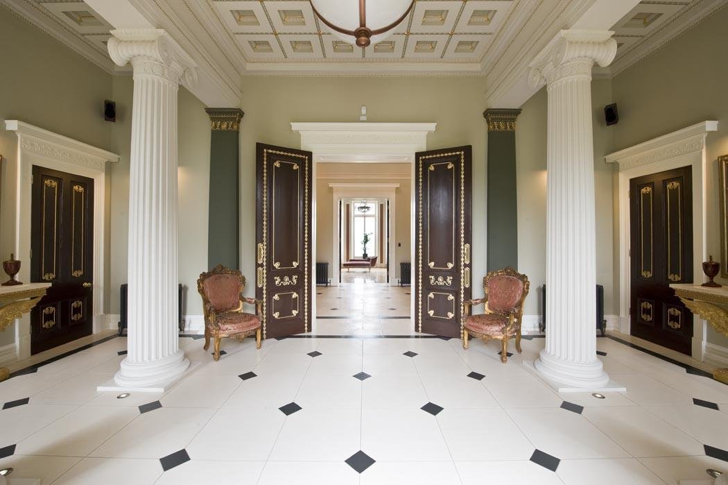 Grand entrance hall with polished doors