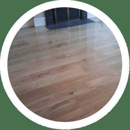 Finished wood floor with fireplace
