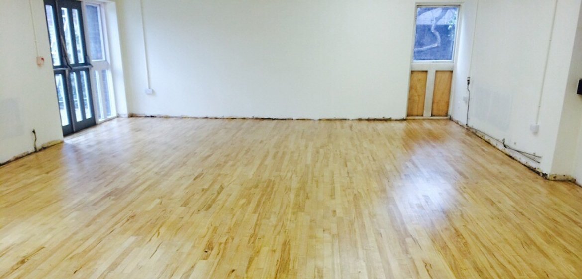 Finished hardwood floor, showcasing floor sanding service