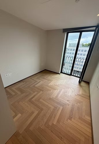 Herringbone pattern wood flooring in a room