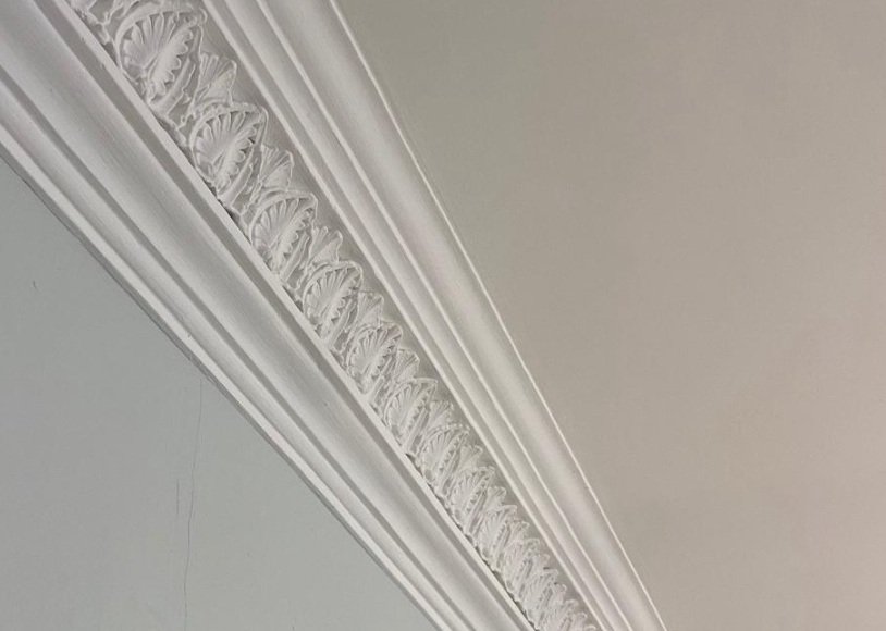 Close-up of finished plaster cornice.