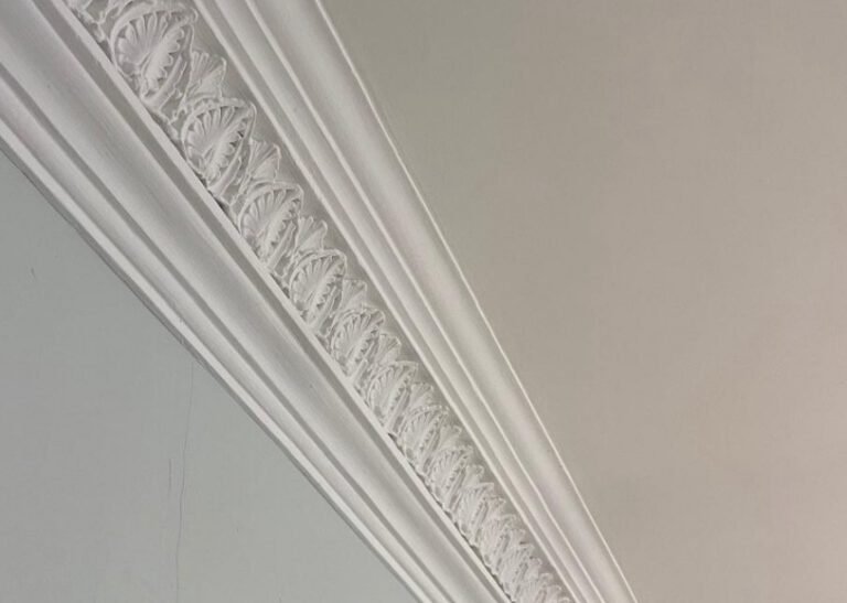 Close-up of finished plaster cornice.