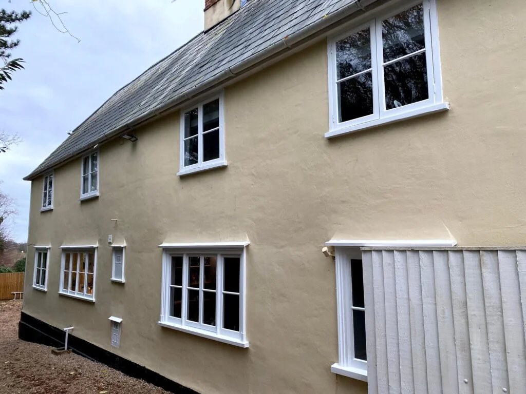 Exterior shot of a house with newly installed sash windows.
