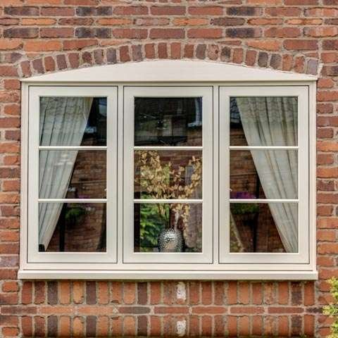Traditional window on brick wall