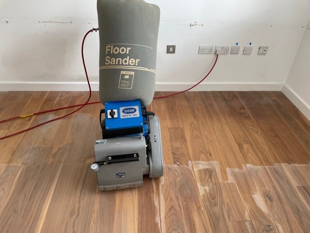 Floor sanding machine in action