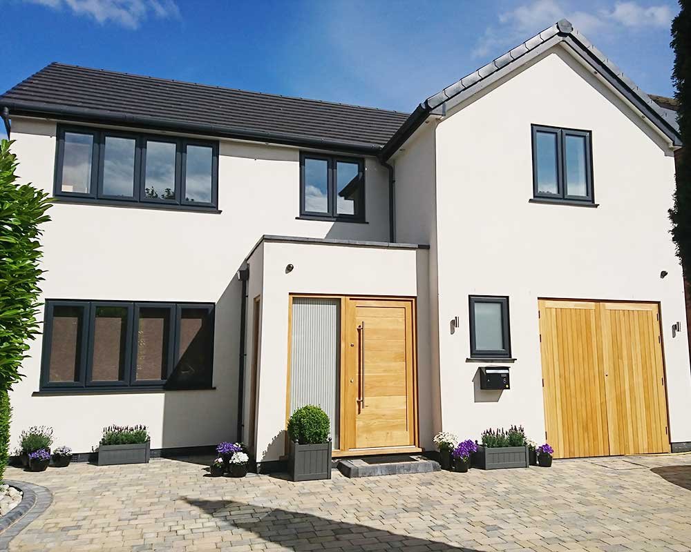Exterior of a house with newly plastered walls.