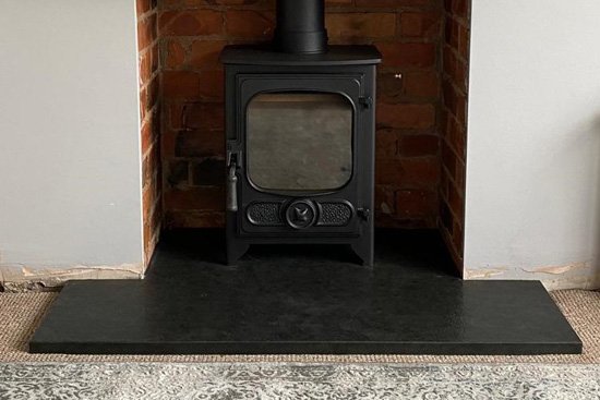 Fireplace with stone hearth