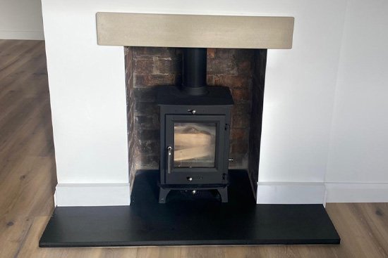 Fireplace with stone hearth and mantle