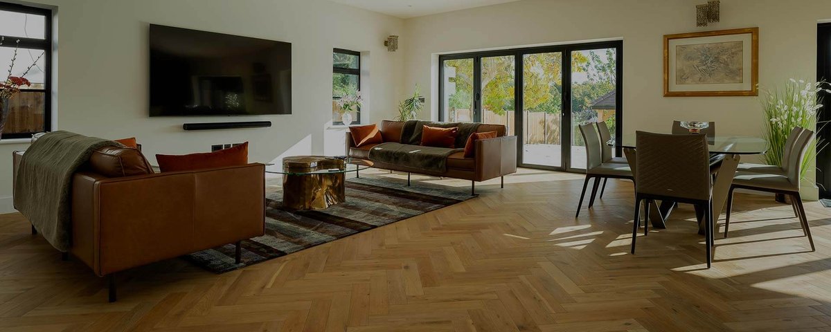 Living room with herringbone wood flooring
