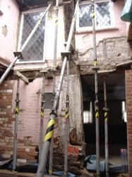 House under renovation, showing plaster work