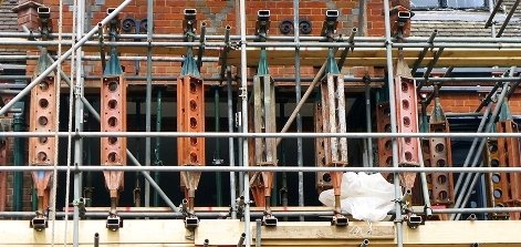 Scaffolding on a building, indicating restoration work
