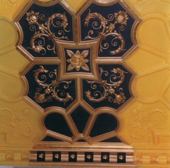 Close-up of an ornate ceiling with gold detailing, highlighting the company's ability to create intricate designs.