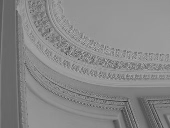 Close-up of installed coving and cornice, highlighting the design and finish.