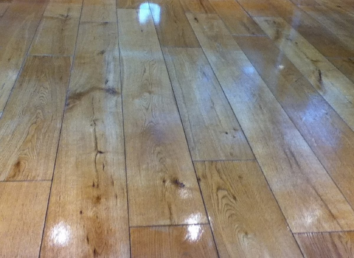 Before and after floor sanding and polishing.