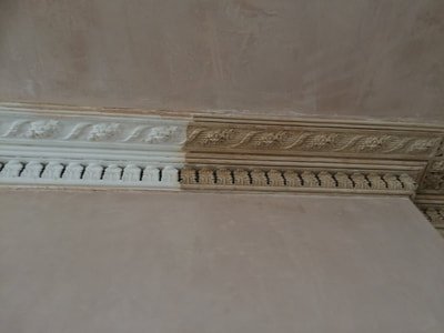 Cornice before and after cleaning