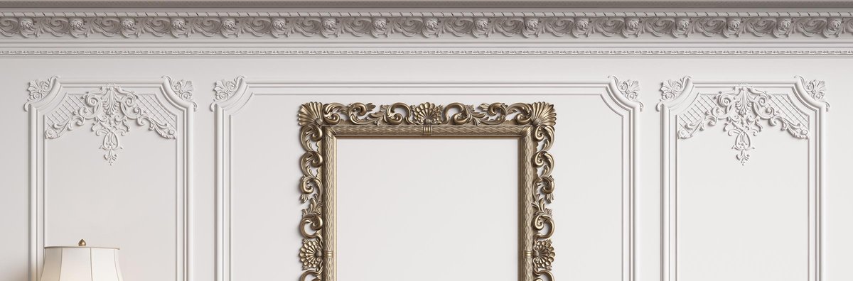 Detailed plasterwork and cornice with a decorative frame.