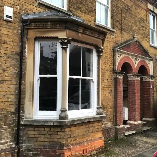 Completed sash window repair/replacement on a bay window.