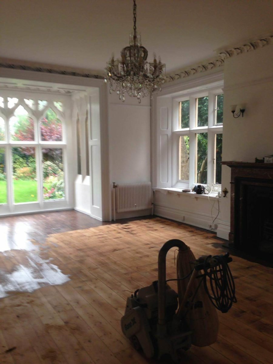 Finished herringbone floor, showcasing the restoration work.