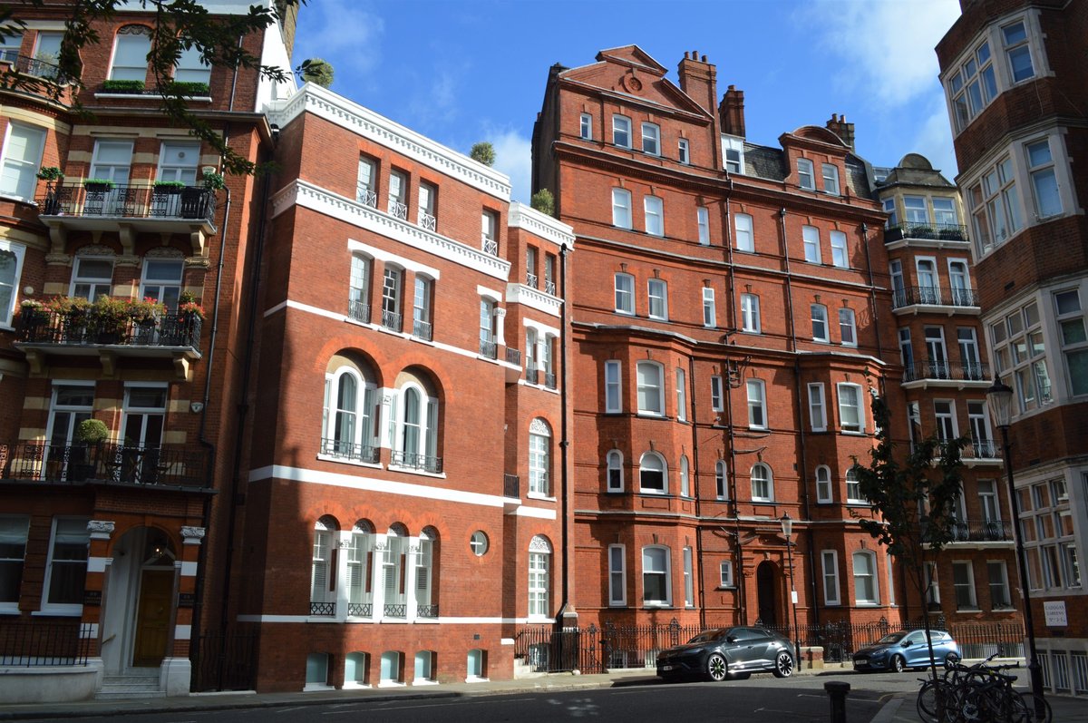Exterior shot of period buildings, relevant to valuation and restoration.