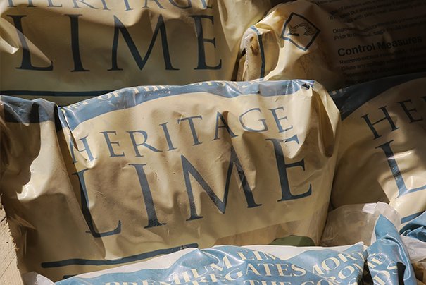 Multiple bags of Heritage Lime product.