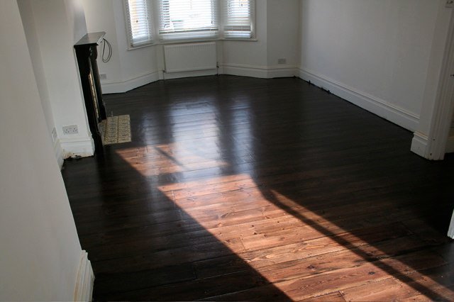 Finished wood floor in a room