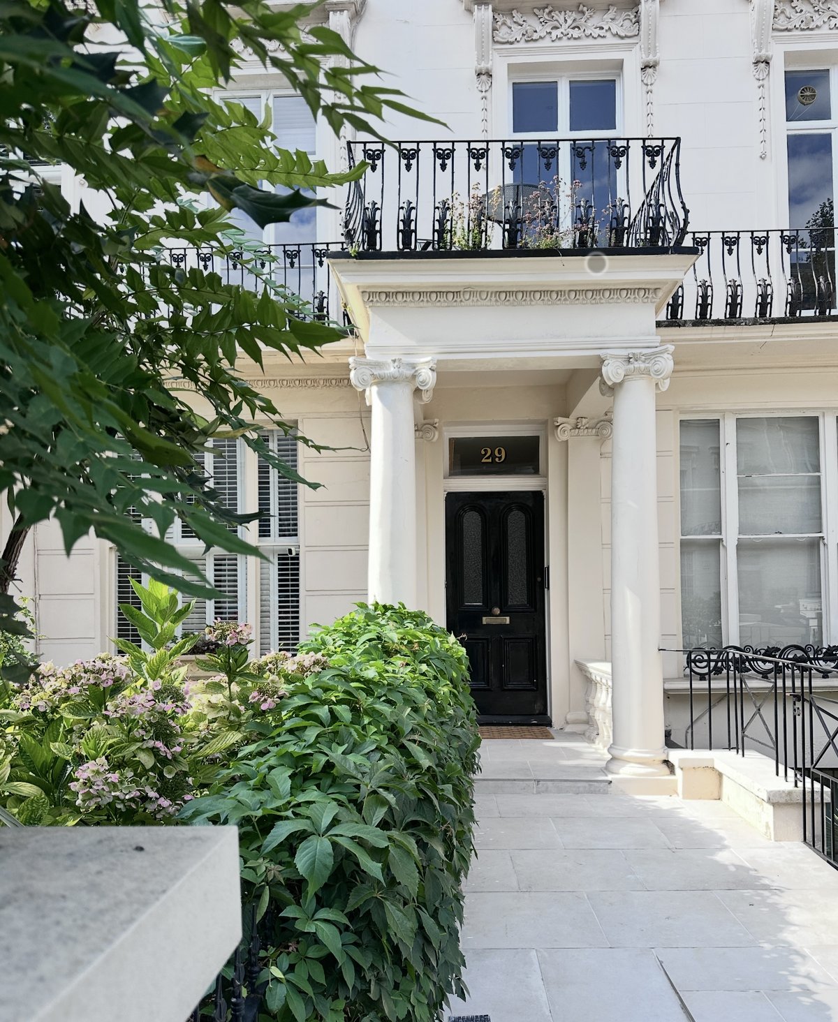Building exterior with plaster mouldings