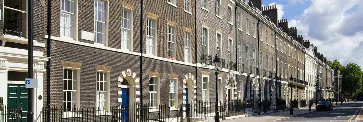 Row of period townhouses, suitable for surveying work.