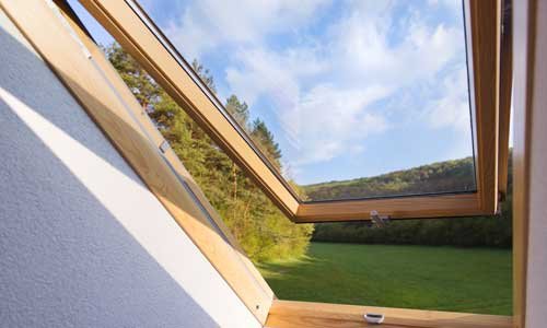 Skylight installation in a roof, showing detail of the frame and glass.