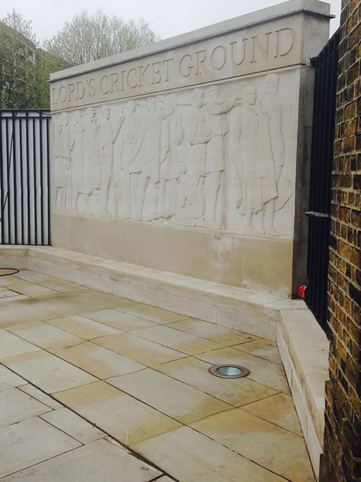 Lord's Cricket Ground wall after restoration, showing the cleaned and restored stone.